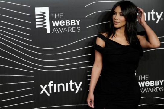 Kim Kardashian West poses as she arrives for the 20th Annual Webby Awards in Manhattan, New York, U.S., May 16, 2016. REUTERS/Mike Segar - RTSEKYY