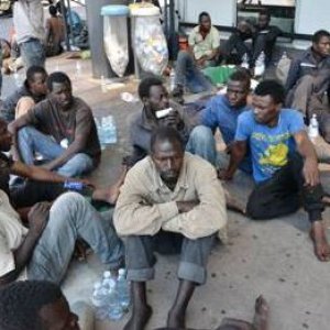 Migrants at Milan Centrale Station