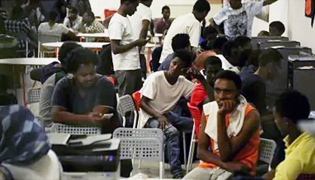 Migrants at Milan Centrale Station